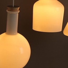 Contemporan și contractat Creative Magic White Glass Bottle Line Droplight