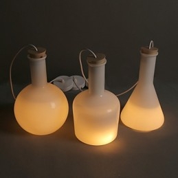 Contemporan și contractat Creative Magic White Glass Bottle Line Droplight