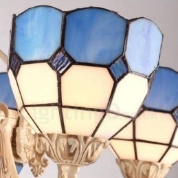 Candelabru metalic integrat în stil mediteranean cu 9 lumini, cu abajur din sticlă