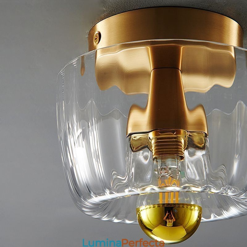 Iluminat de perete modern cu abajur din sticlă transparentă